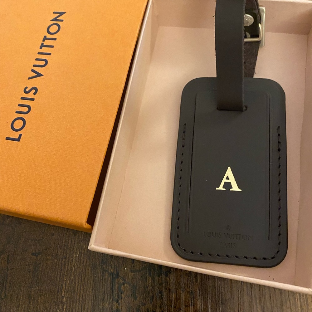 Authentic New Louis Vuitton luggage tag